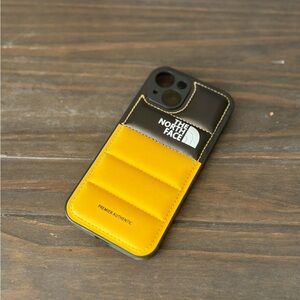 The North Face iPhone 15 Case Yellow Black | Puffer Style Shockproof Cover